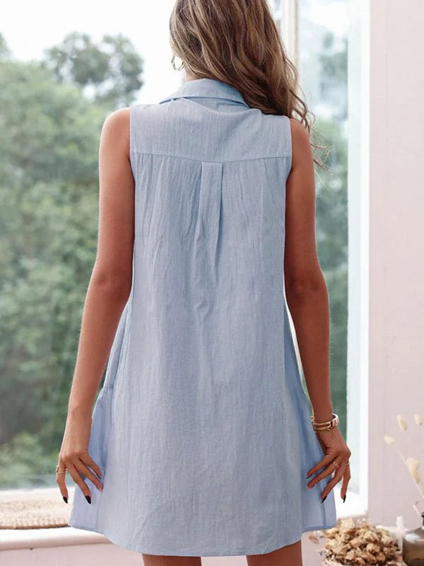 Light blue sleeveless collared dress with textured fabric, shown from the back on a model.