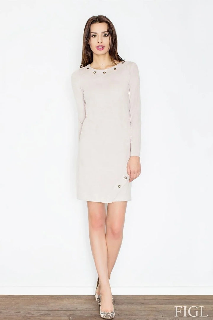 Light beige long-sleeve dress with eyelet details at the neckline and hem, on model.