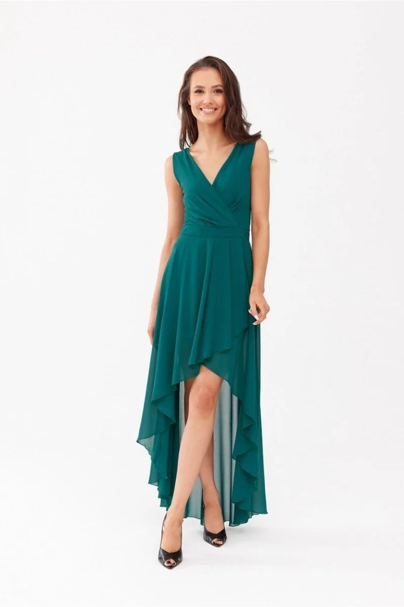 Teal high-low dress with a V-neck and layered skirt, worn by a model.