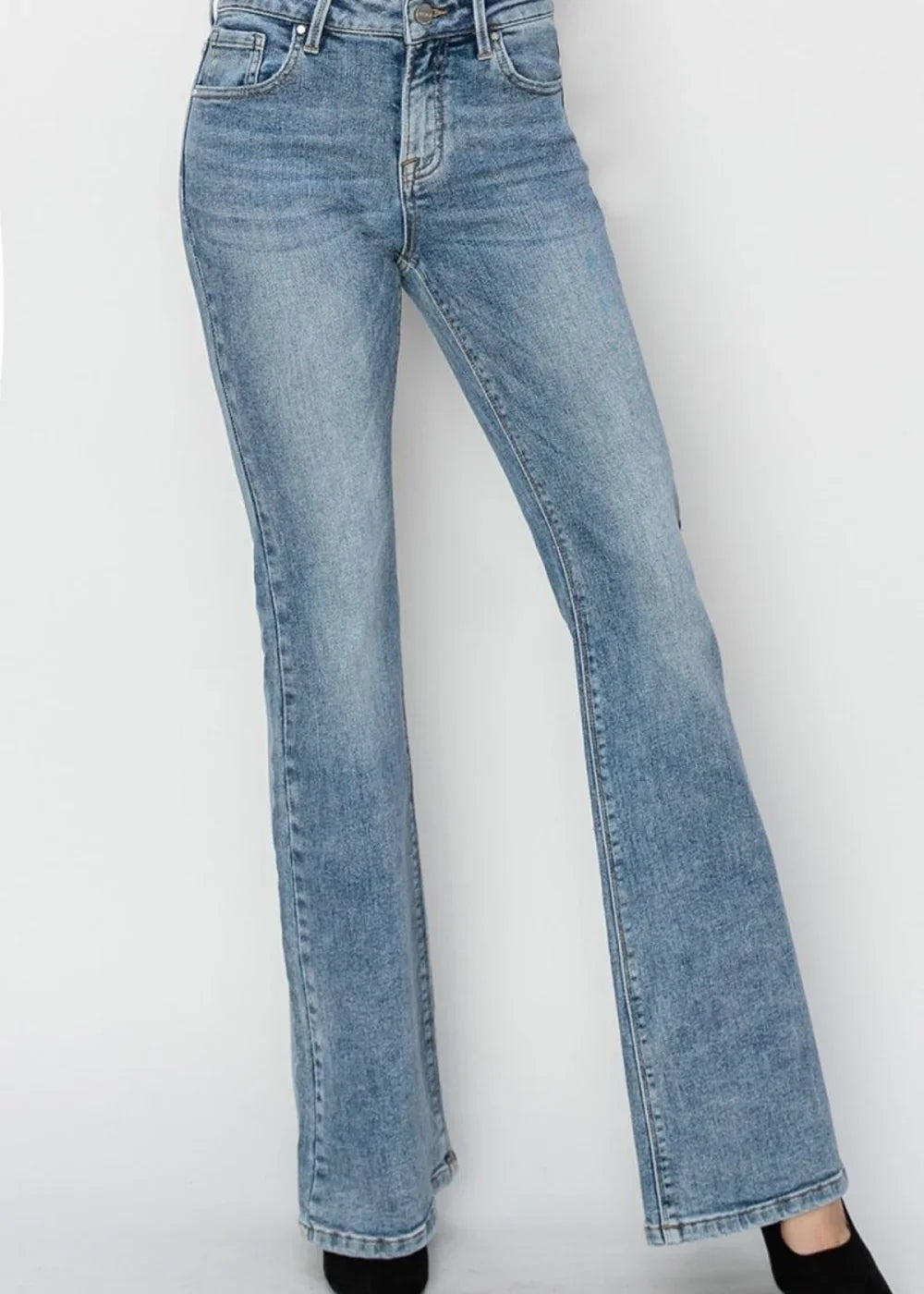 Light wash flared denim jeans with a regular fit, showing texture.