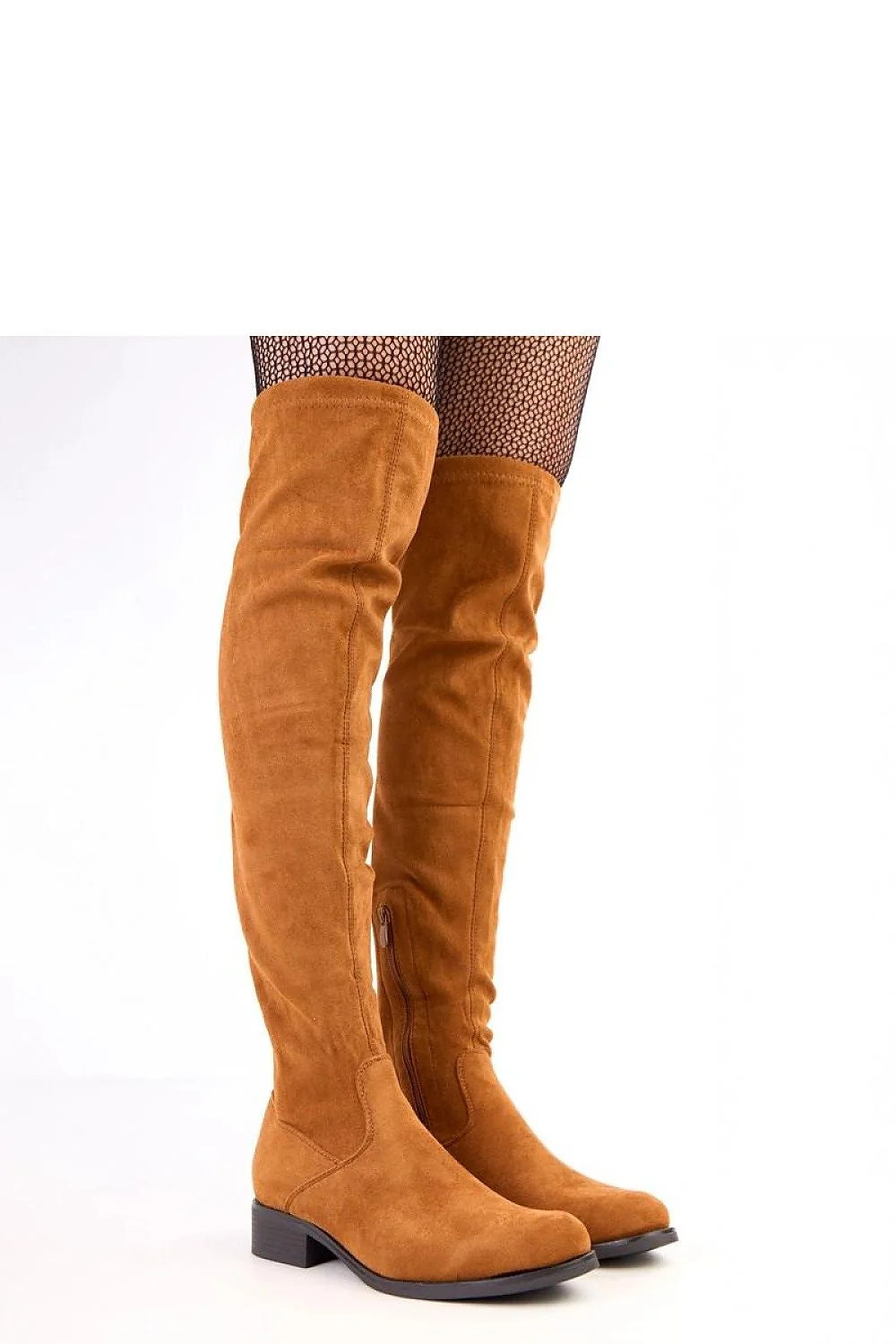 Brown suede over-the-knee boots with a side zipper, worn with fishnet stockings.