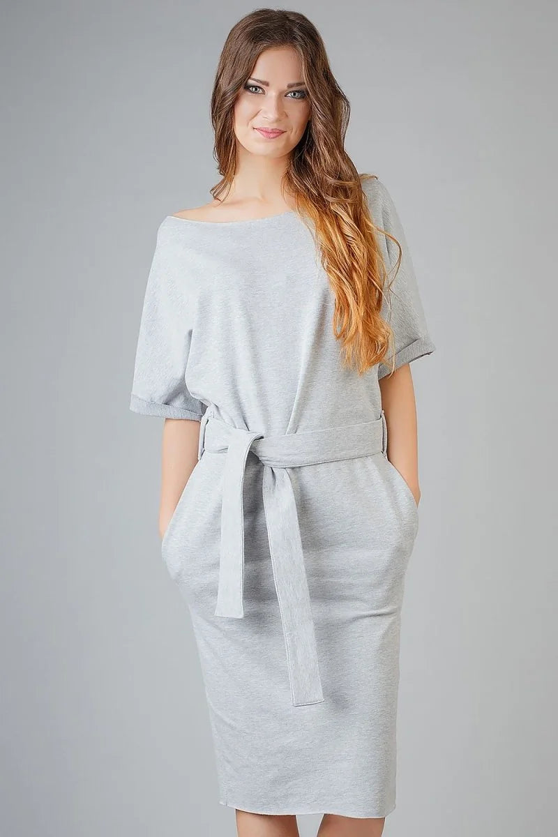 Light gray cotton blend dress with relaxed fit and self-tie belt on a model.