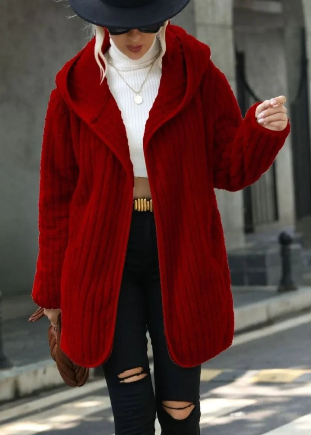 Red textured knit hooded cardigan with a regular fit on a model.