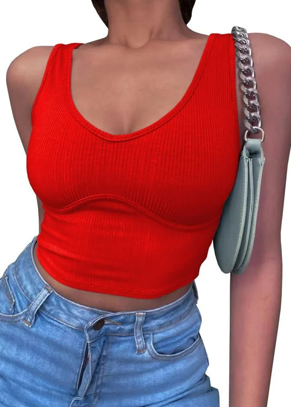 Red ribbed knit v-neck crop top with a curved seam under the bust, worn with light wash denim jeans.