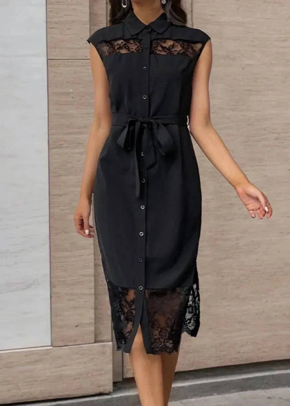 Black lace-trimmed shirtdress with a belted waist and button-down front.