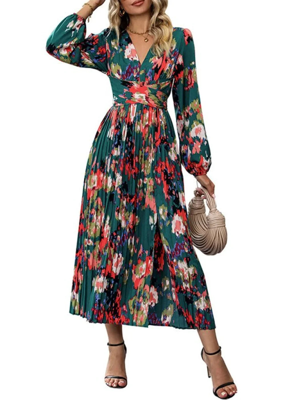 Green floral print maxi dress with V-neck, long sleeves, and pleated skirt, on model.