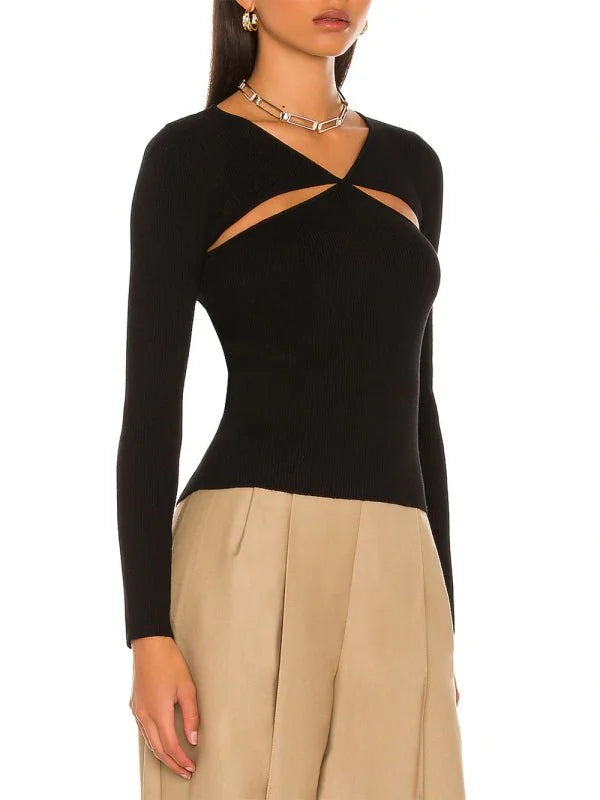 Black ribbed knit long-sleeve top with a cutout neckline and gold-tone chain necklace on model.