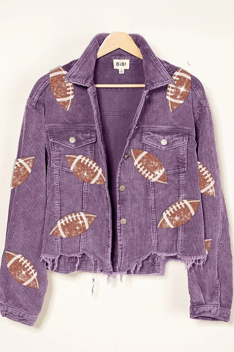 Purple corduroy jacket with football appliques and frayed hem, shown on a hanger.
