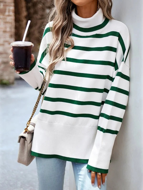 White and green striped turtleneck sweater with long sleeves, worn by a model.