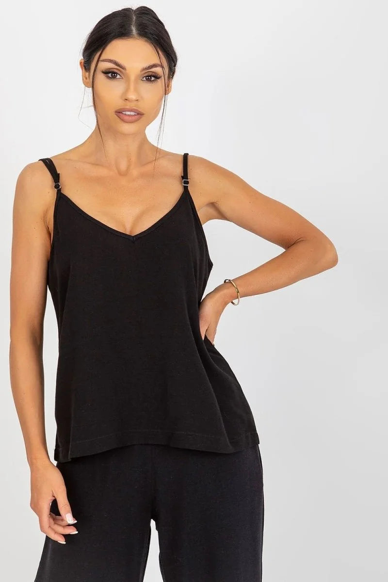 Black V-neck cami with adjustable straps and a relaxed fit, worn by a model.