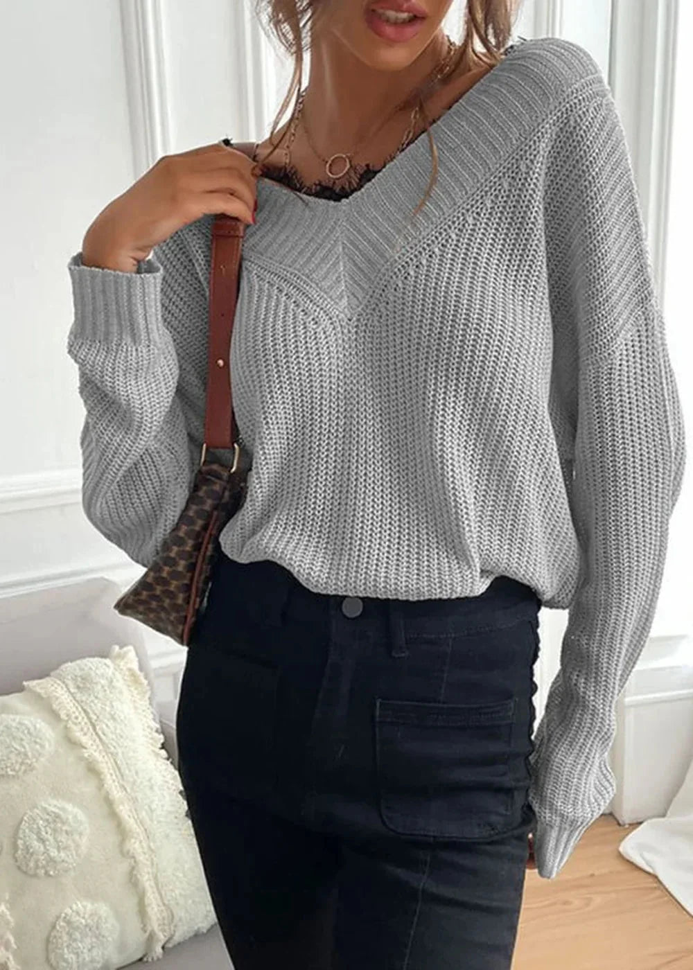 Black women's knit sweater with lace detail