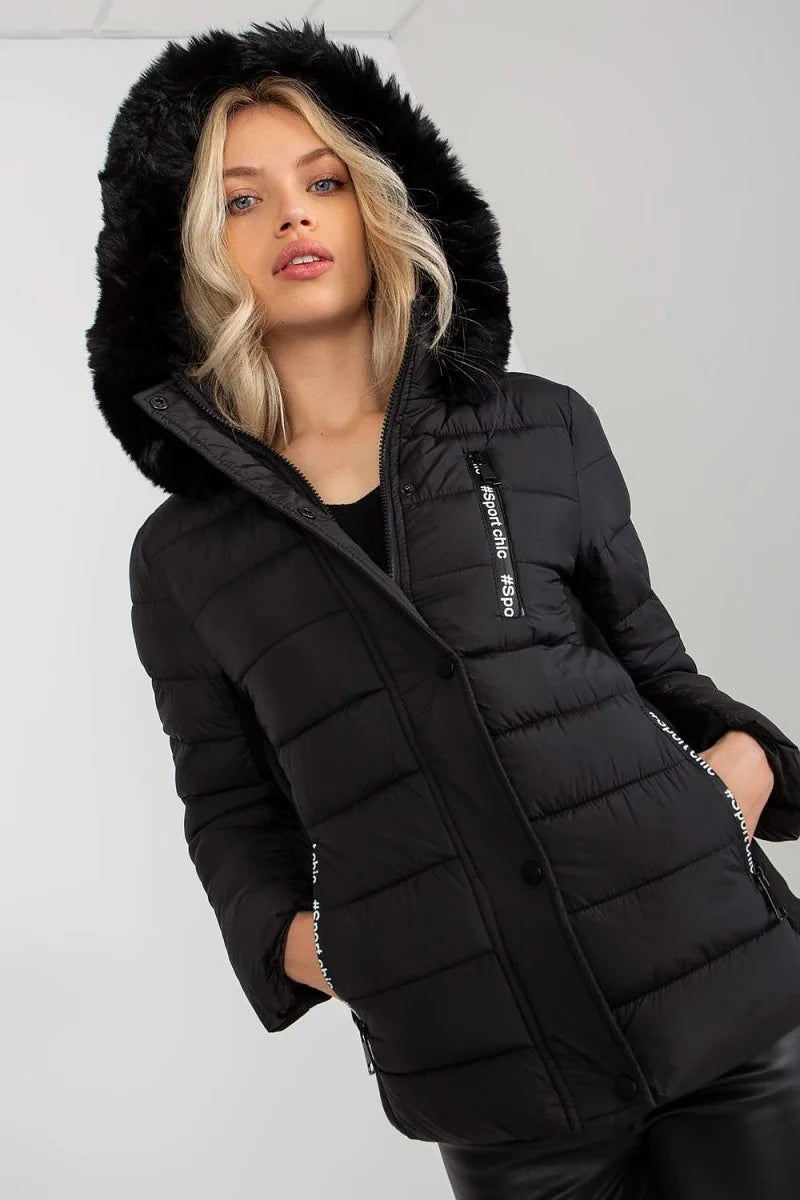 Black puffer jacket with faux fur hood, featuring "sport chic" text detail on sleeve.