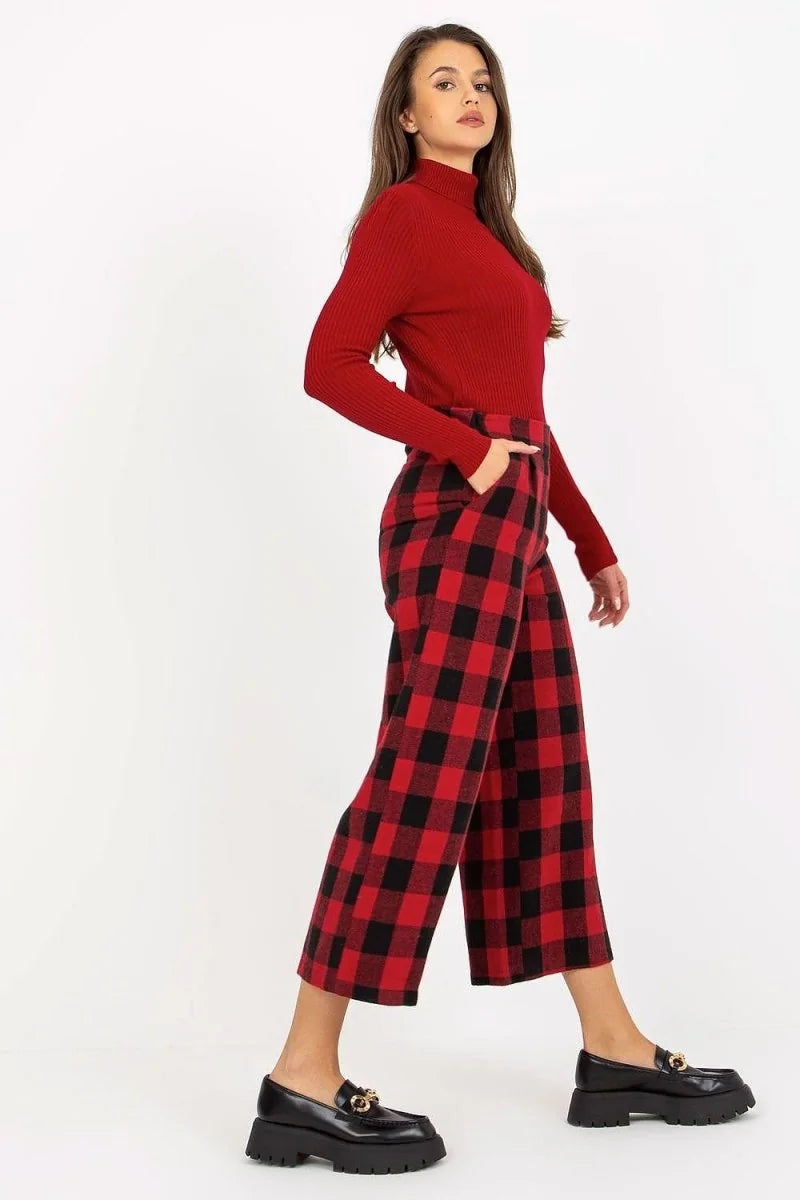Red and black buffalo check wool culottes with a regular fit on a model.