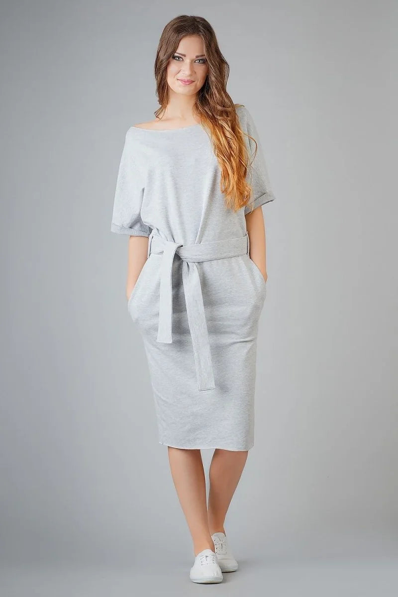 Light grey cotton blend t-shirt dress with a self-tie belt and pockets, worn by a model.