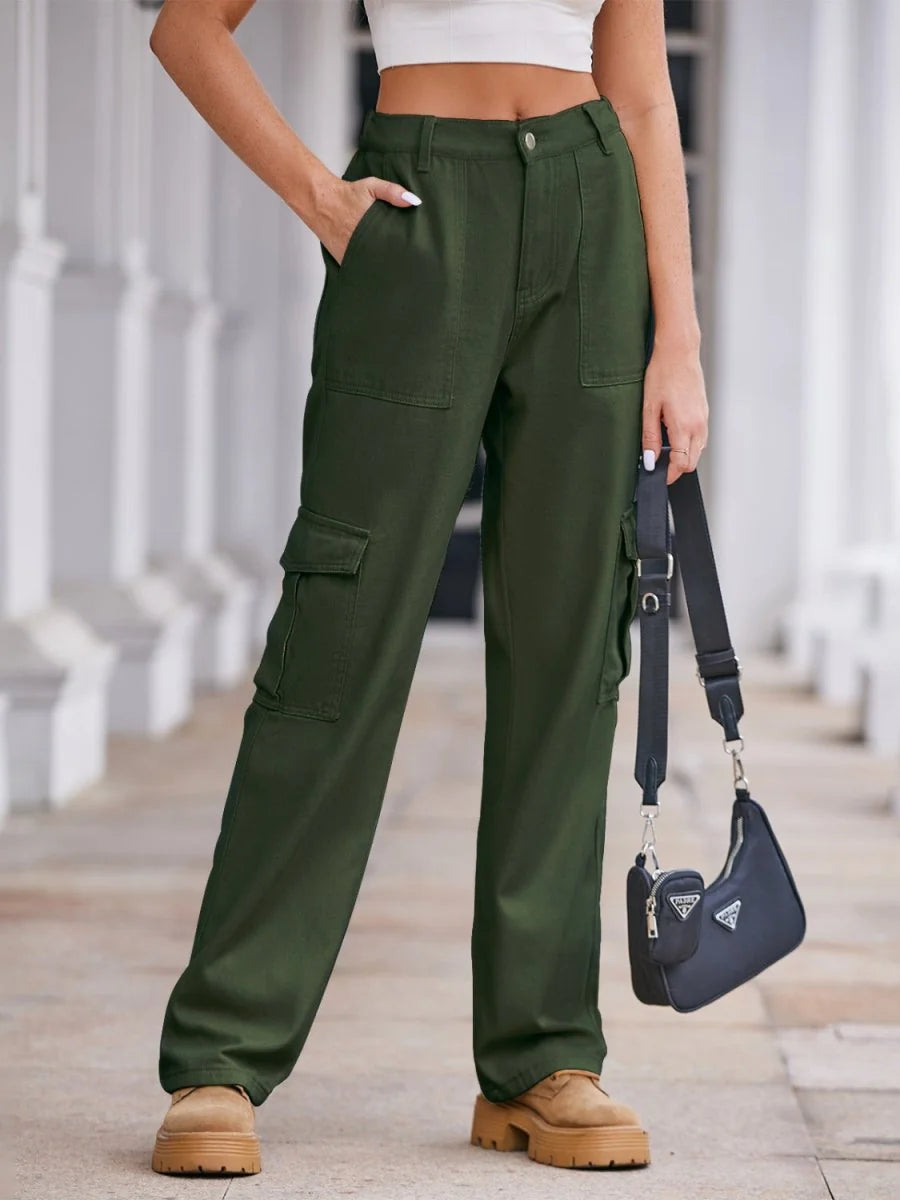 Olive green cargo pants with a regular fit, featuring multiple pockets and tan platform boots.