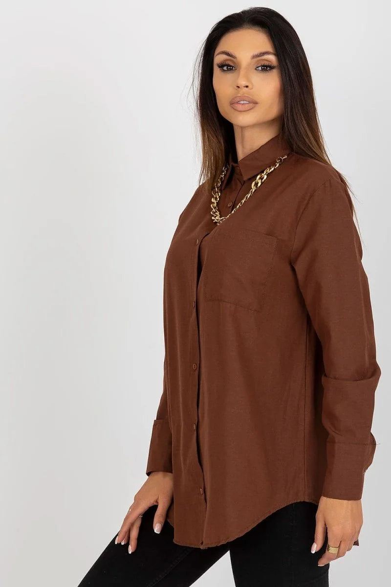 Brown cotton-blend loose-fit button-up shirt with a gold chain necklace on a model.