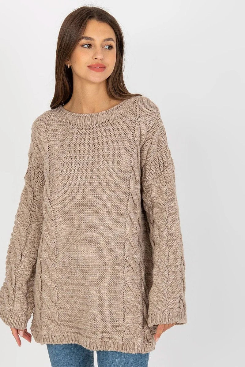 Beige knit sweater with cable knit details and an extended cut.