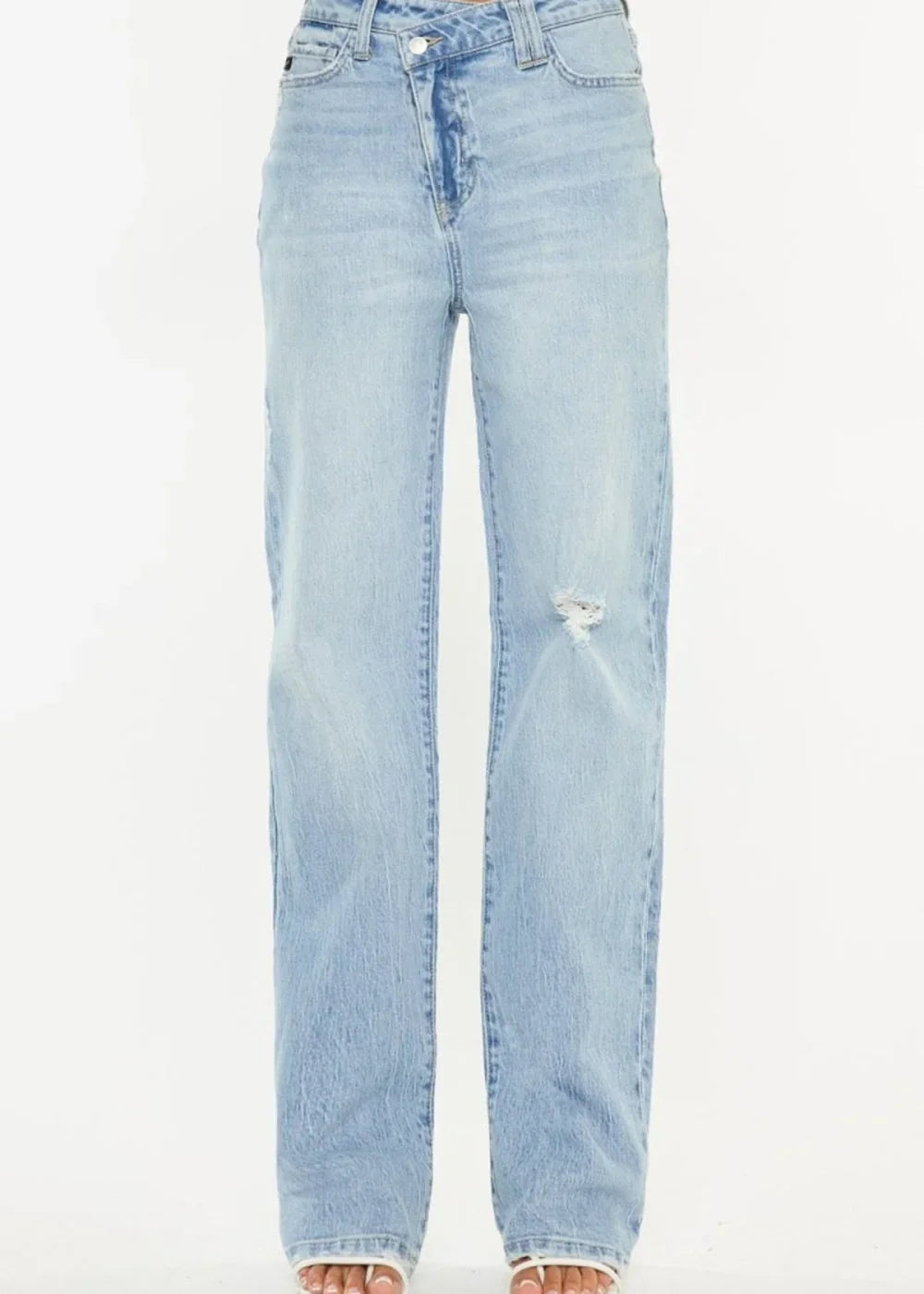 Light wash high-rise jeans with a distressed knee and wide leg.