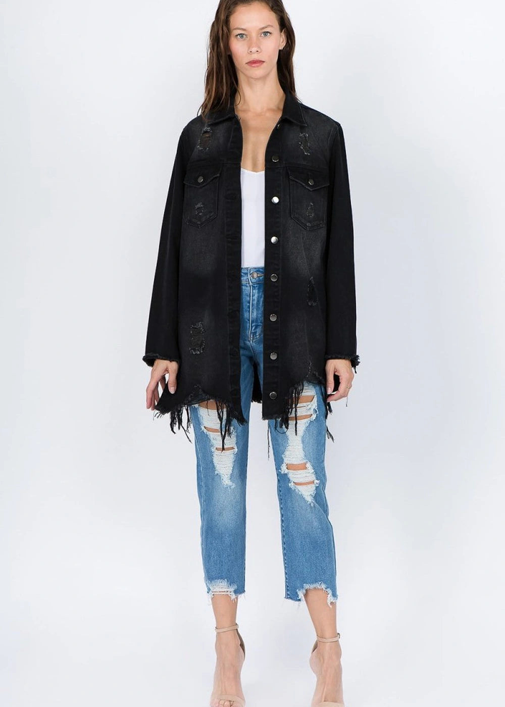 Distressed denim jacket with frayed hem