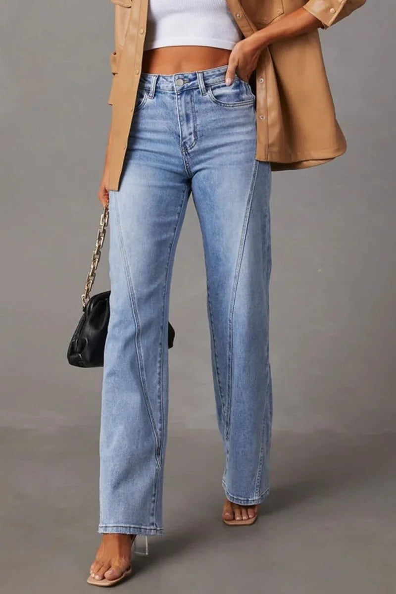 Light wash denim jeans with a regular fit and unique seam detailing down the legs.