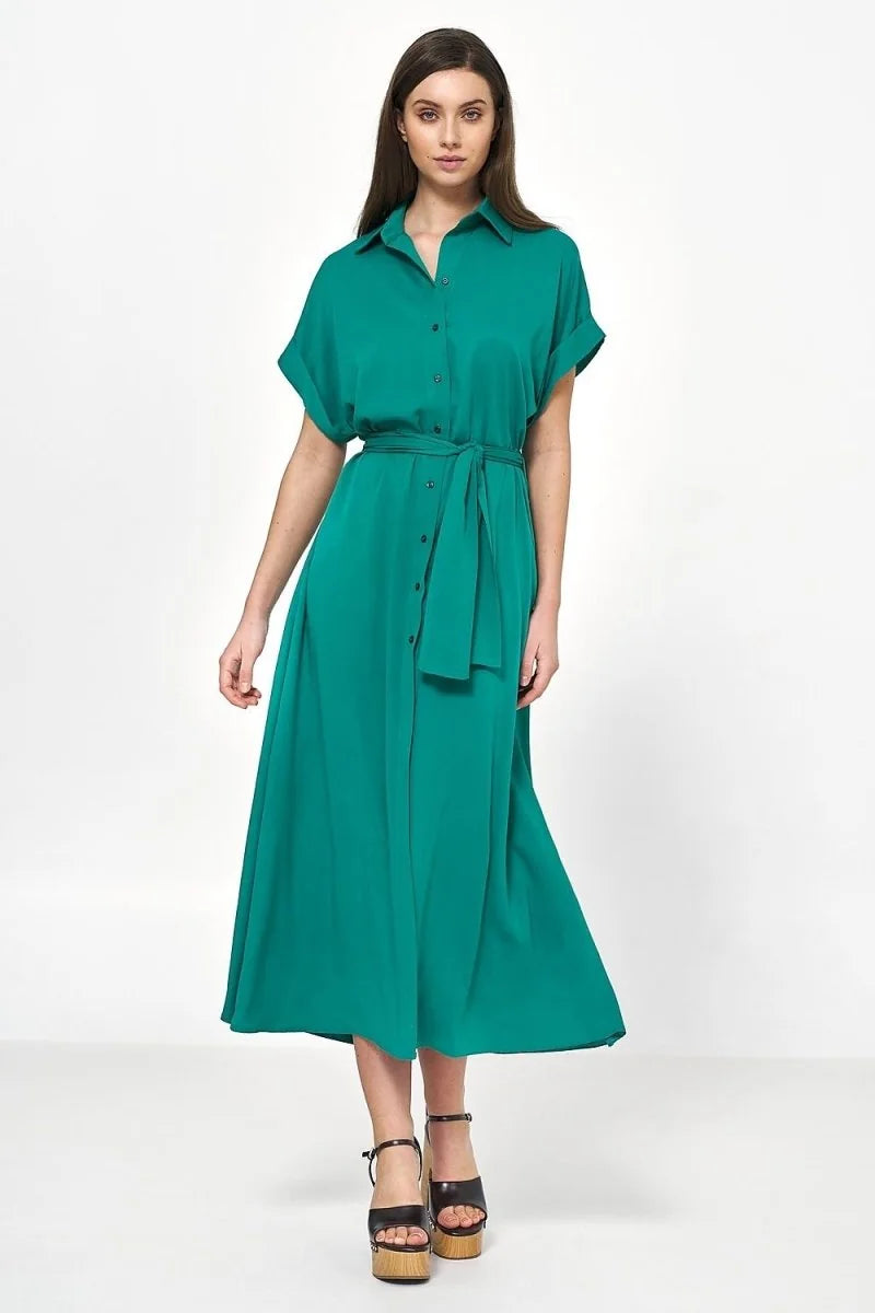Teal viscose shirt dress with short sleeves, belted waist, and button front, worn by a model.