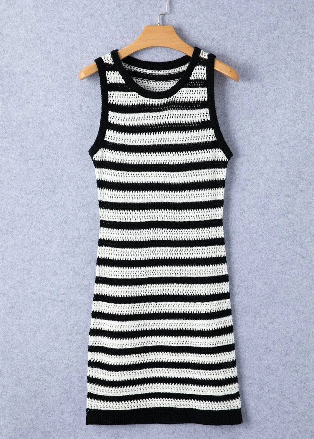 Black and white striped crochet knit sleeveless mini dress with a slightly stretchy fit.