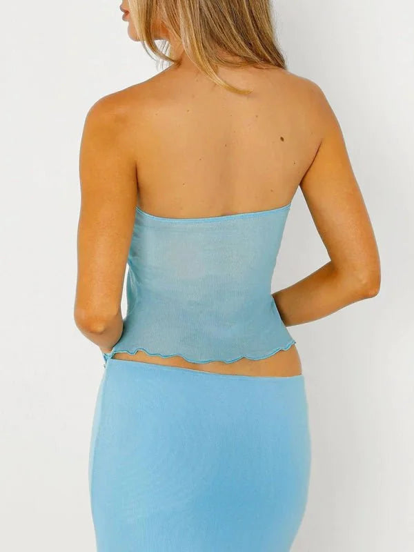 Light blue strapless top and skirt set, showing the back and side of the outfit on a model.