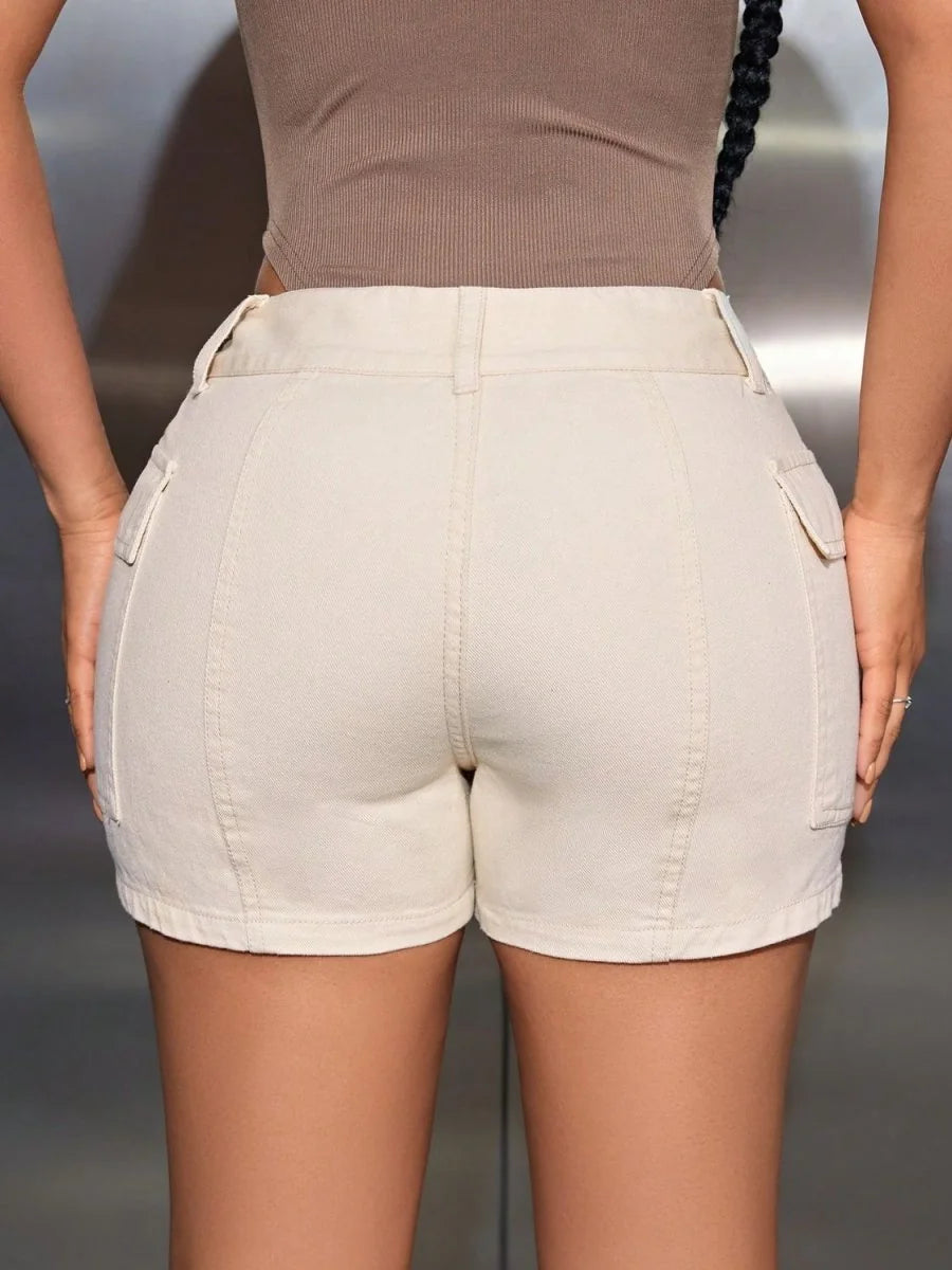 Cream denim shorts with cargo pockets, showing a close-up of the back fit.