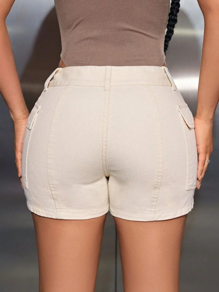 Cream denim shorts with cargo pockets, showing a close-up of the back fit.