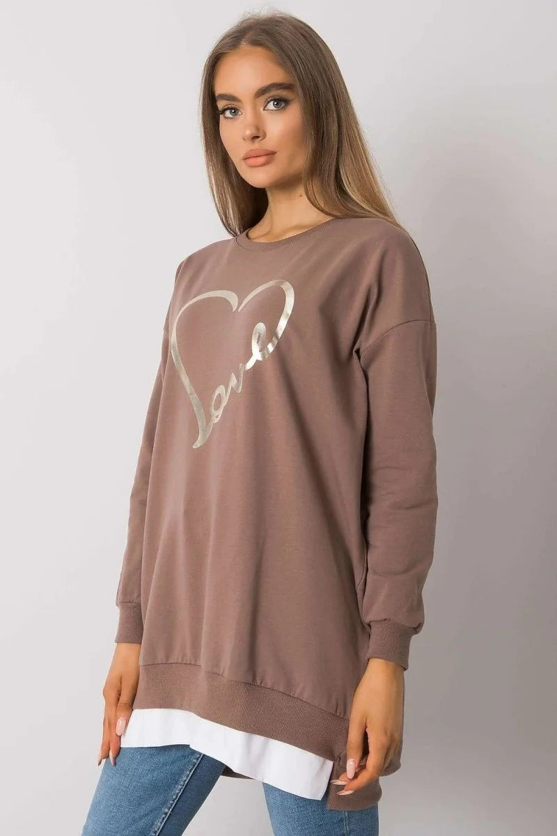 Loose-fit brown long-sleeve top with a metallic heart and "love" graphic, layered white hem.