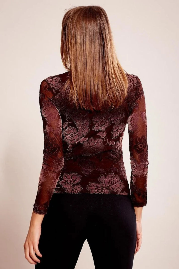 Burgundy long-sleeve top with a sheer floral burnout pattern and a slightly sparkly texture.