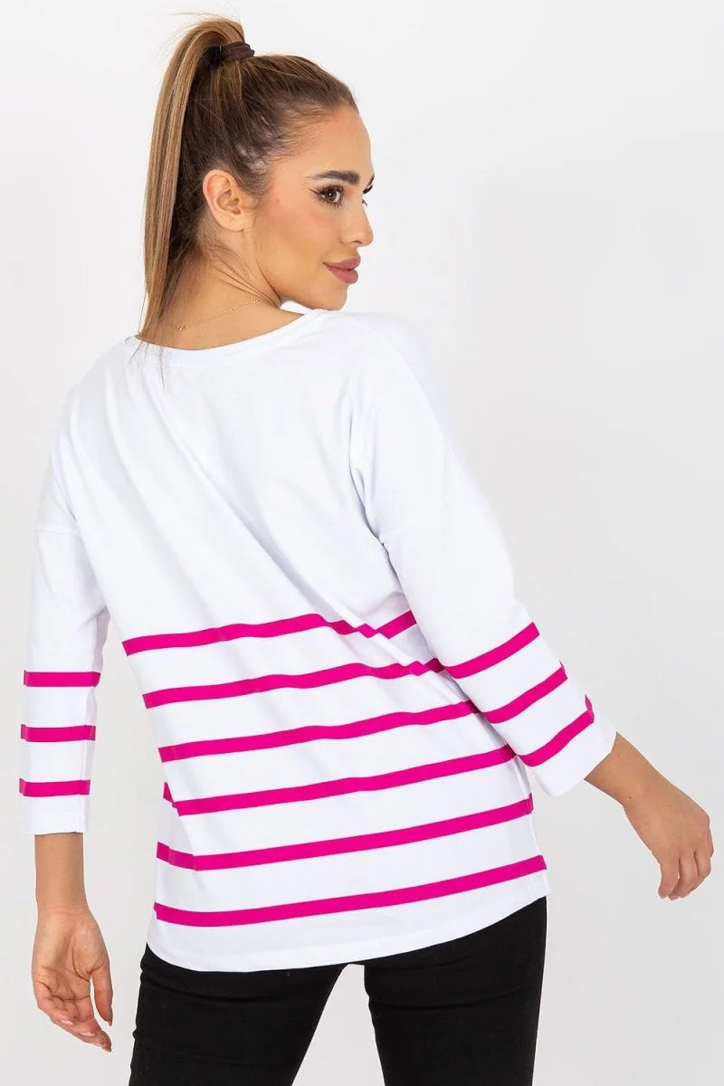 White long-sleeved top with bright pink horizontal stripes on the lower half and sleeves.