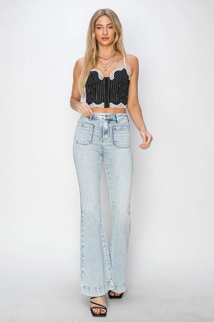 Light wash flared jeans with front patch pockets and a high waist.