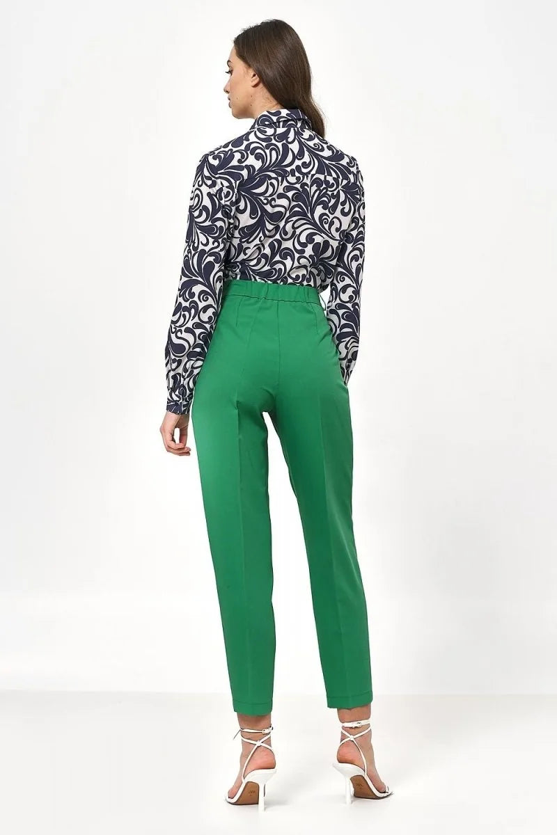 Green high-waisted trousers with a regular fit, shown from the back on a model.
