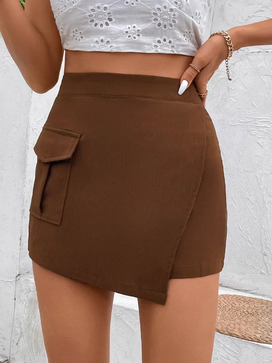 Brown faux wrap mini skirt with cargo pocket detail and gold bracelet.