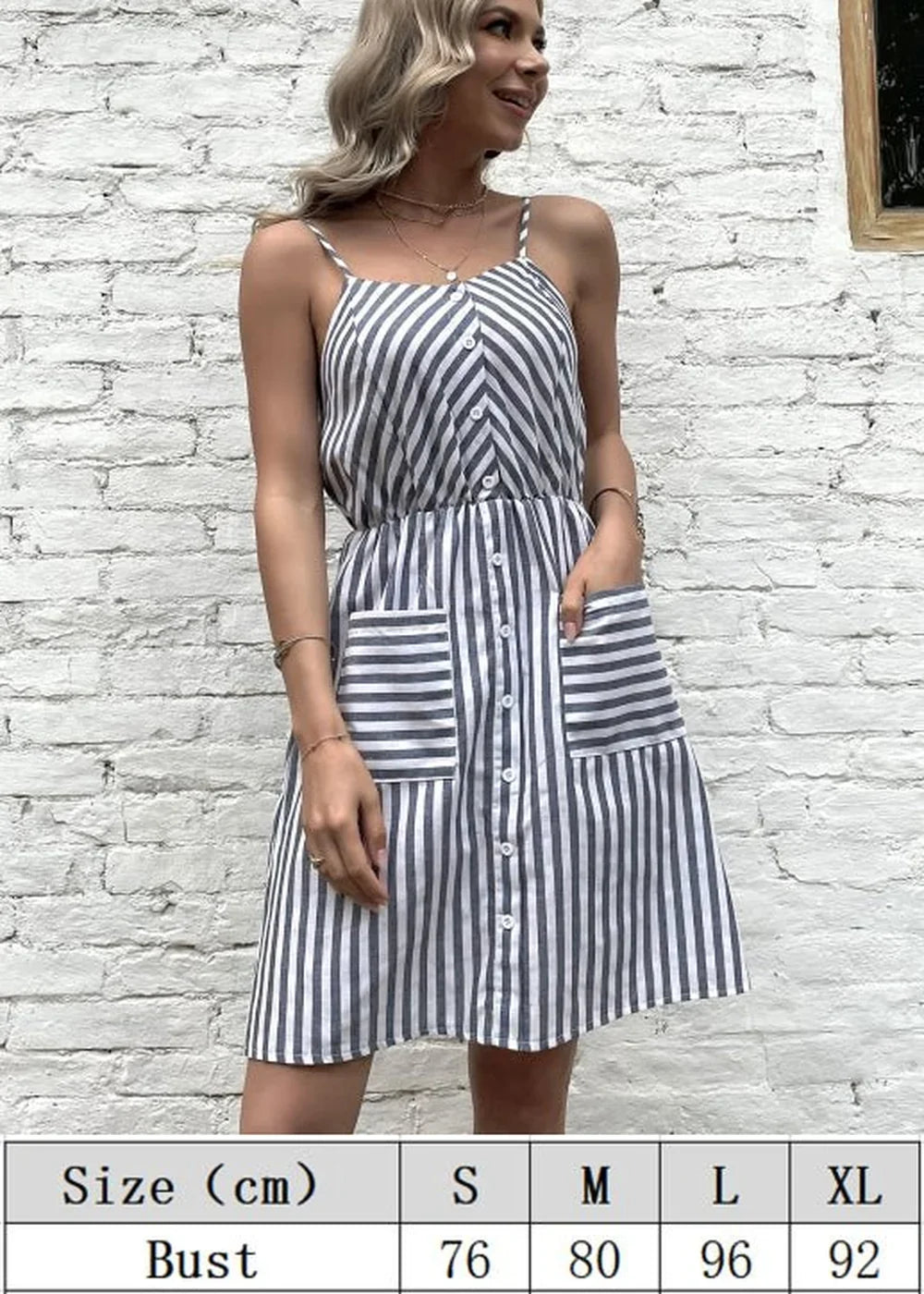 Navy and white striped midi dress with button front and patch pockets on model