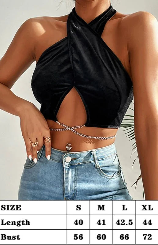 Black velvet halter top with chain detail and butterfly belly ring.