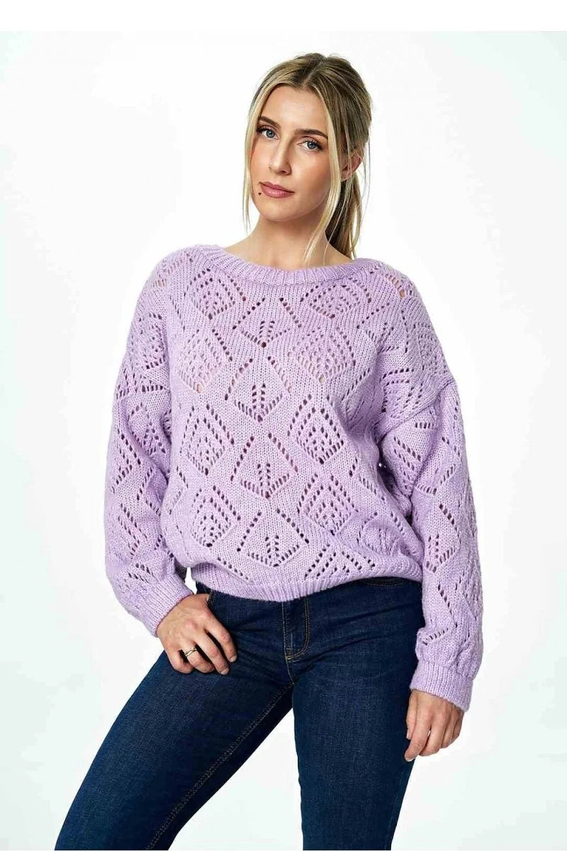 Lavender open-knit sweater with diamond pattern, on model with dark wash jeans.