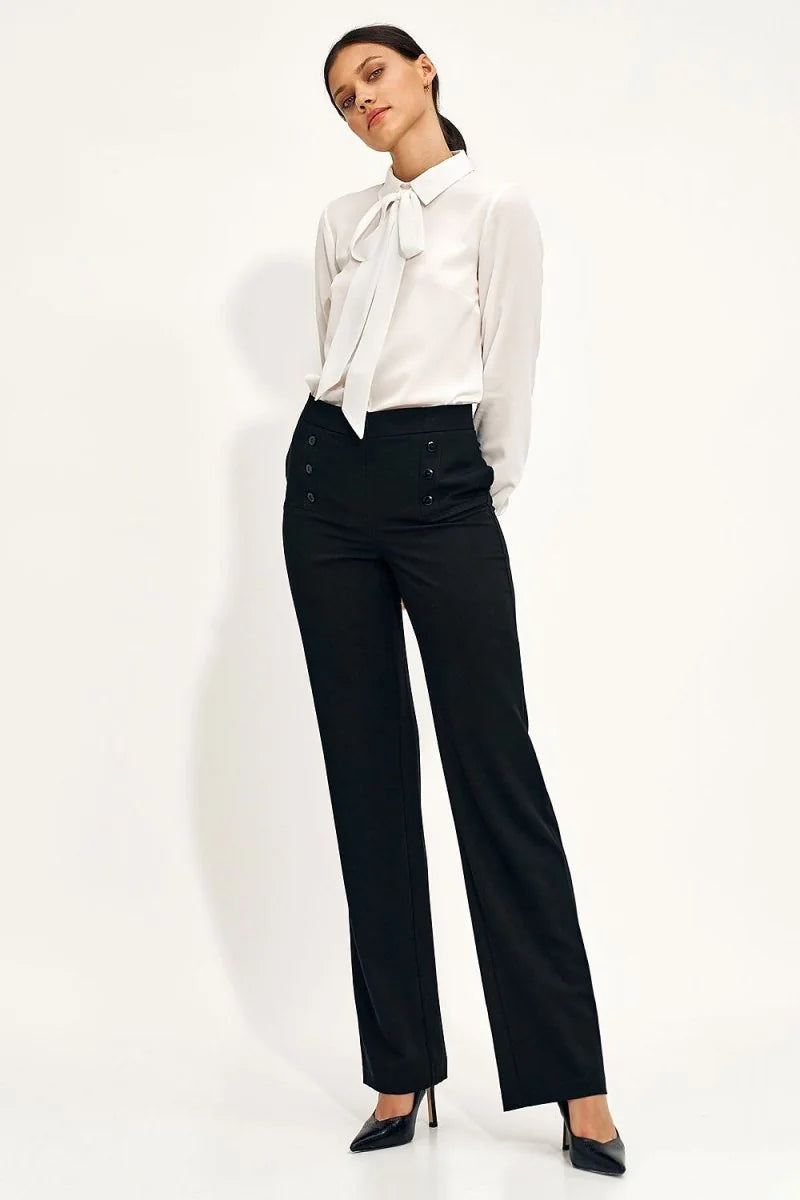 Black high-rise trousers with double-button detail and wide leg on model