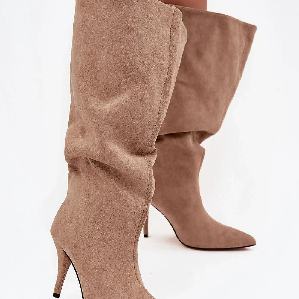 Heel boots Step in style
