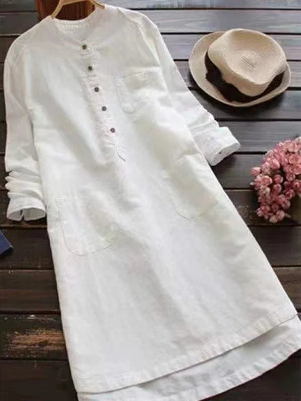White linen-blend midi dress with button-down front, pockets, and mandarin collar.