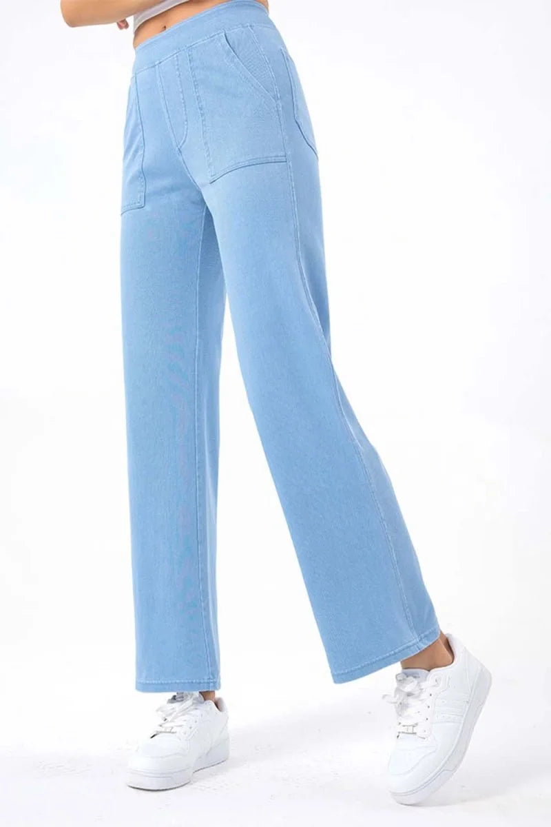 Light blue denim pants with a regular fit, featuring a straight leg and two front pockets.