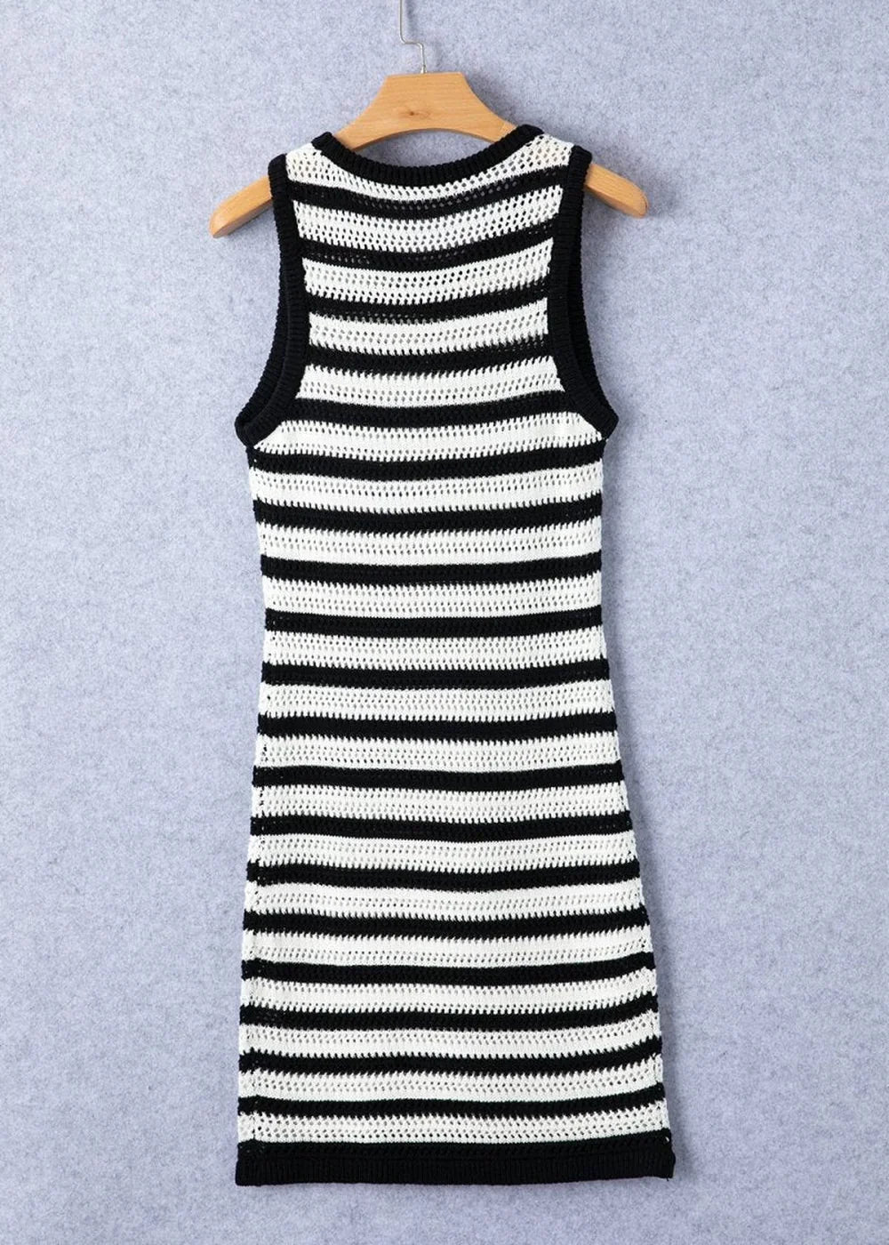 Black and white striped crochet sweater dress with a sleeveless, slightly stretchy fit.