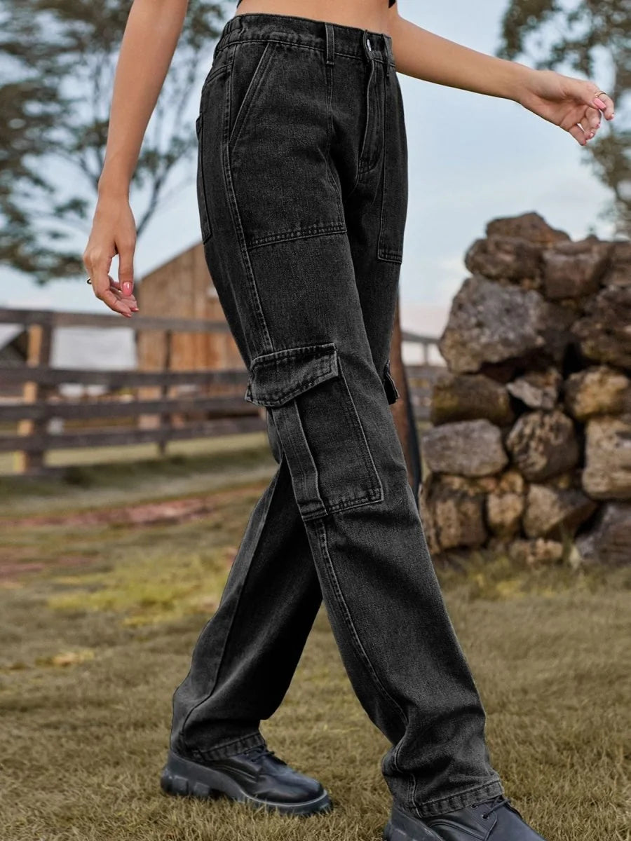 Black denim cargo pants with a relaxed fit and utilitarian pockets.