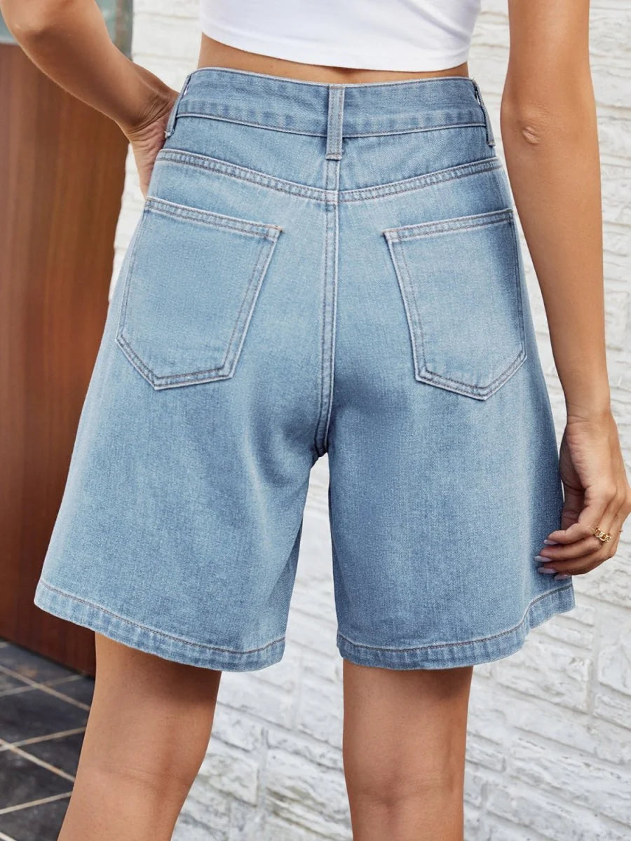 Light wash denim shorts with a relaxed fit and visible pocket stitching.