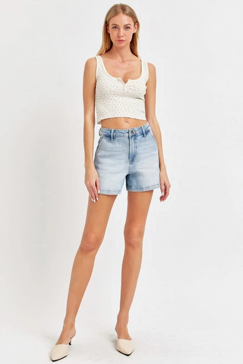 Light wash denim shorts with a slightly stretchy, regular fit, on a model.