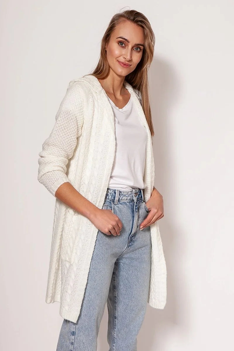 Off-white cable knit hooded cardigan with pockets, worn by a model with light wash jeans.