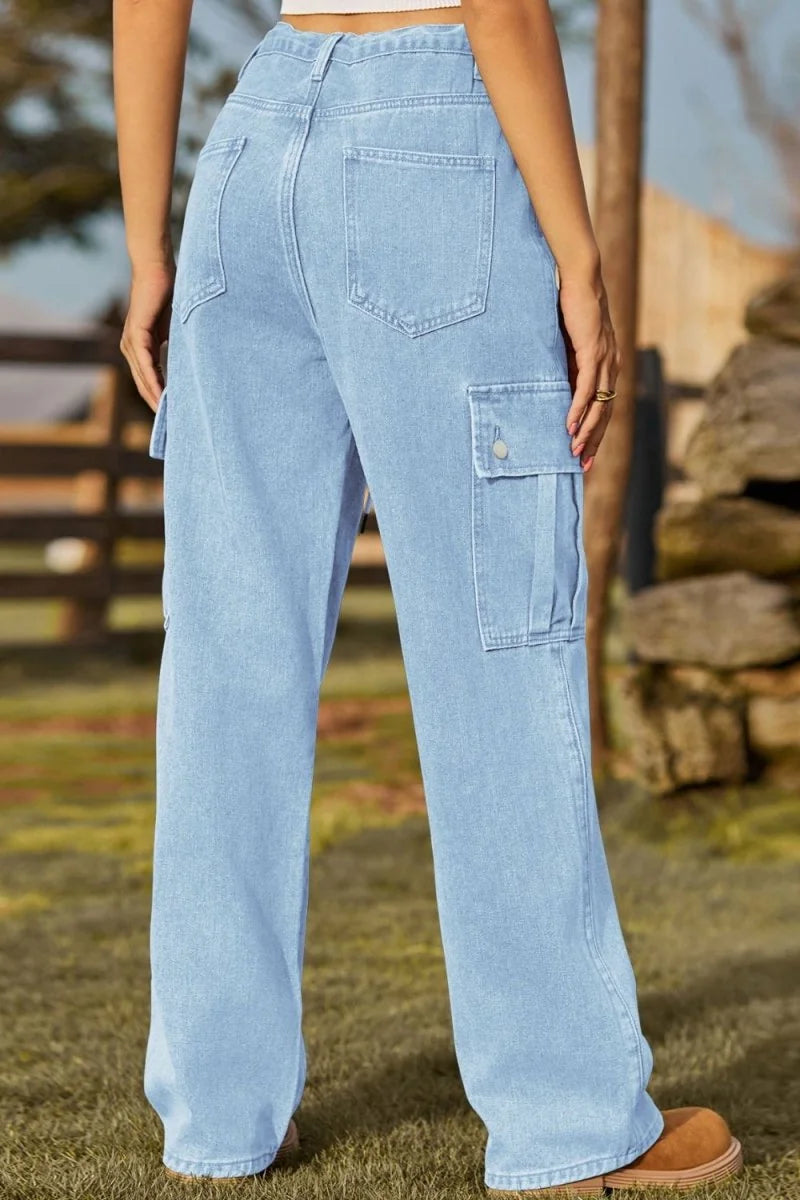 Light wash denim cargo pants with a relaxed fit, featuring multiple pockets and a raw hem.