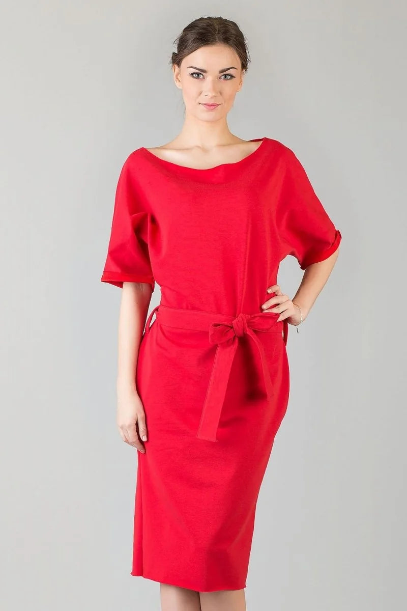 Red cotton blend relaxed fit dress with a tie waist, on a model.