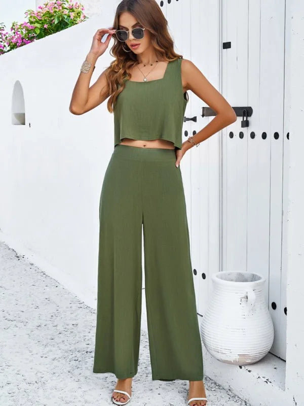 Olive green sleeveless crop top and wide-leg pants set on a woman.